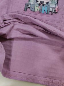 A beautiful purple T-shirt for women and girls.