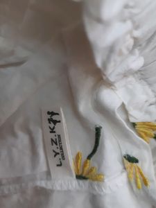 Stylish White Top With Embroidery