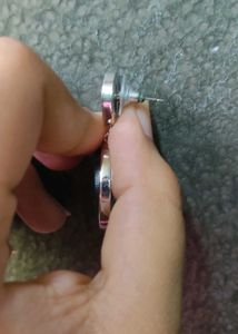 black earrings with silver body