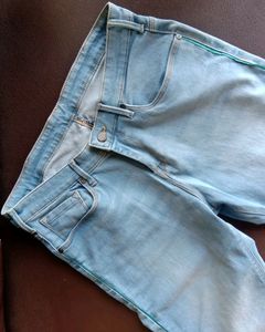 Light Wash Jeans with Green Stripe