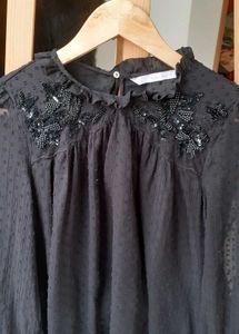 Elegant Black Sheer Blouse