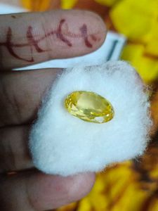 A yellow sapphire, also known as Pukhraj (पुखराज)