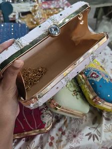 Laces Stones Hand Clutch With Sling