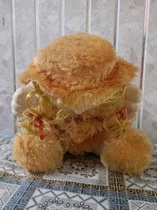 Doll With Brown Hat And Dress