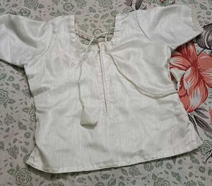 A basic white top type blouse