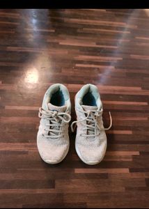 2 Pair Of White Shoes