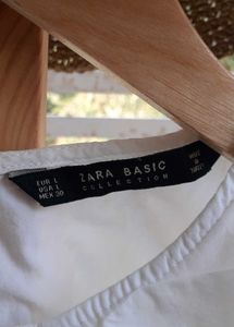 White Sleeveless Blouse