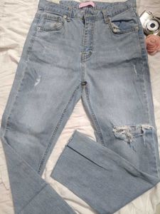 Ripped Light Wash Denim Jeans