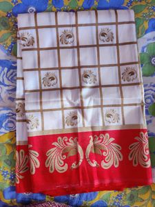 Beautiful white saree and red border with golden p