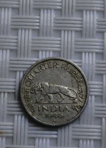 A 1946 British India quarter rupee coin