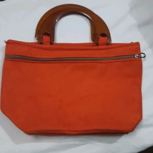 handcrafted purse with kundan work