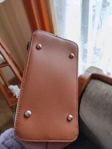Brown Bucket Shaped Structured Handbag