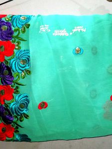 Elegant Turquoise Floral Saree