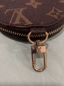 Mini Clutch On Any Bag Louis Vuitton