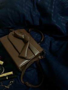 Brown Handbag 🚫 Only Not The Make-up Products