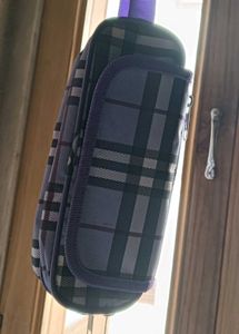 Stylish purple plaid waist bag.