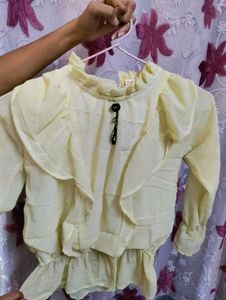 Chic Yellow Ruffle Front top | Swiss Dot Sheer Lon