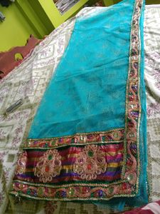 Teal Embellished Net Saree