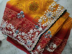 Red and yellow bandhni saree