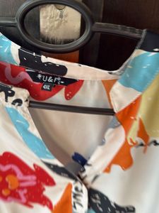 plus size mandarin collar abstract print top