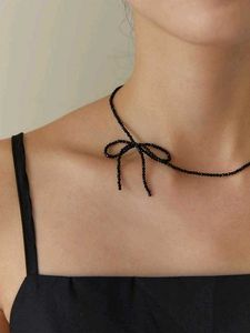 Black Beaded Bow Necklace