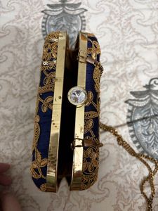 Embroidered box clutch