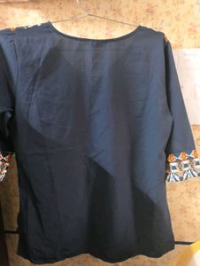 Branded Blue Top.