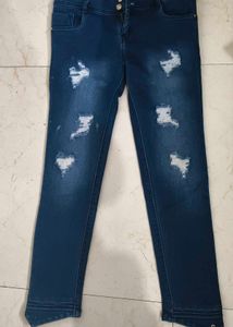 Ripped Blue Denim Jeans