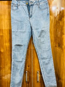 Ripped Knee Light Wash Jeans