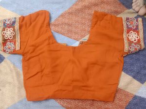 Orange embroidered Heavy Saree