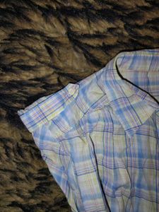 Y2K checks fitted shirt.