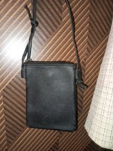 black sling bag