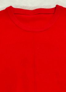 red woolen top