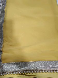 Yellow Saree with Pearl Border