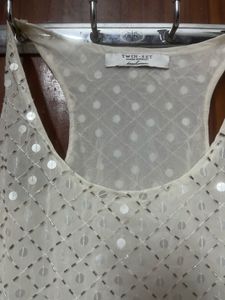 Long Sleeveless Top