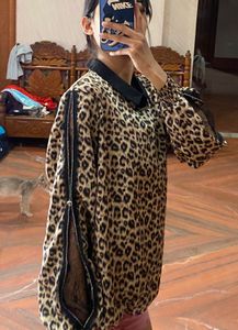 Leopard Print Sheer Sleeve Top