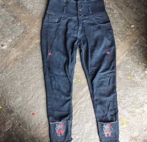 High-Waisted Embroidered Jeans