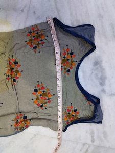 A Grey Sleeveless Kurti