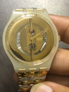 Swatch Golden Ladies Watch Strechable Metal Strap
