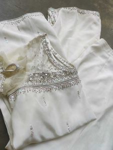 A White Short Kurti With Straight Pent