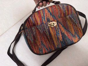 Multi-Color Woven Pattern Sling-cum-Handbag