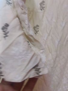 One Time Used Cream Embroidered Kurti