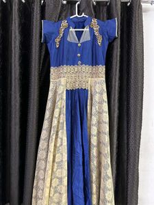 Festive Blue Gown With Gold Flare