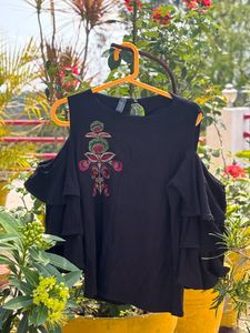 black Shoulder Cut top