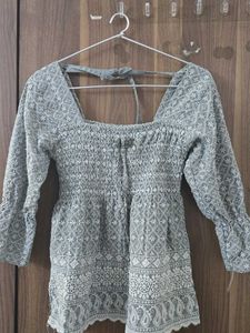 Embroidered Peplum Top