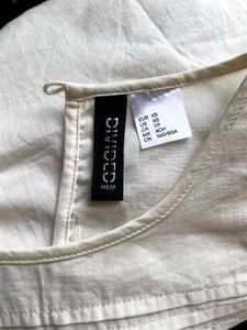 Brand new H&amp;M white Ruffled Sleeveless Top