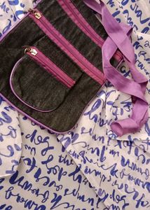 Sling Bags Of Combo Colours, 🟣 And 🔵 With 4 Big Compartments With 1 Small Compartment Also With Adjustable Straps Zips At Good Condition Material Is Soft And Flexible