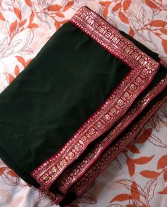 Elegant Green Saree with Pink Border