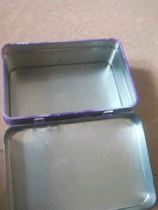 A Tin Box For Keeping Pokemon Cards
