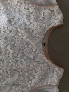 Elegant White Lace Kurti with Sheer Sleeves